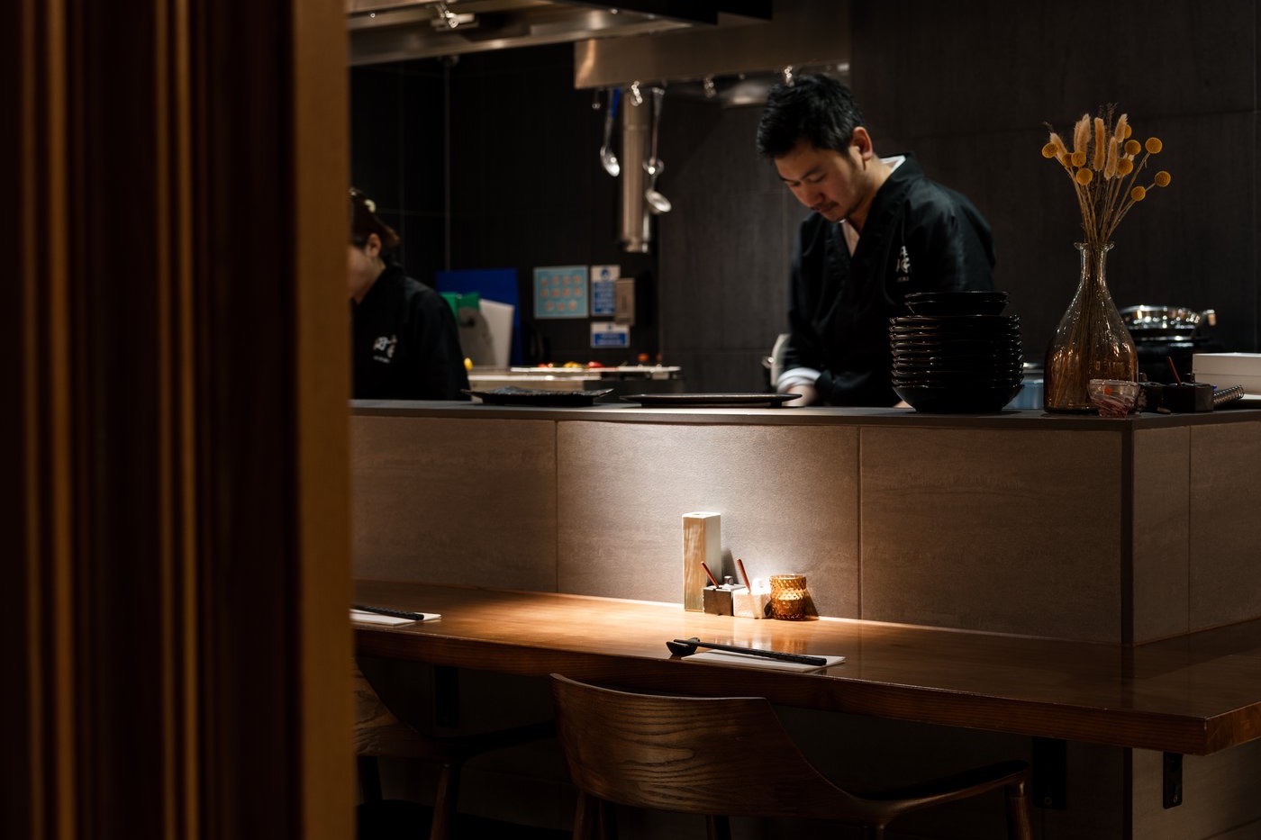 The yakitori counter at Hotori, with the chef at work behind it
