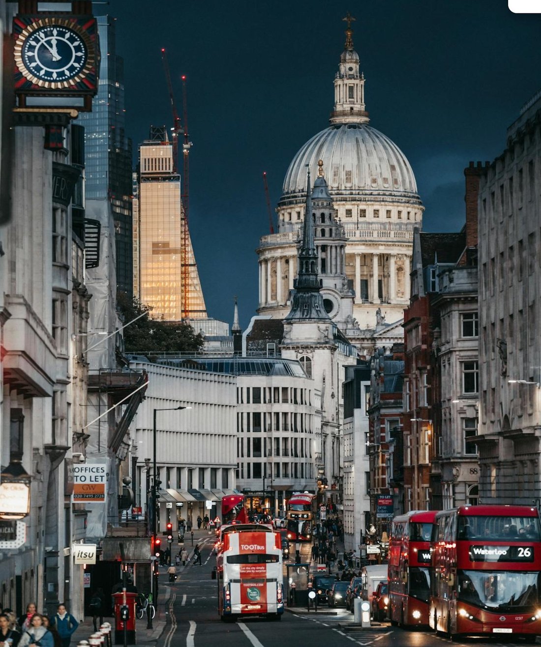 St Paul's Cathedral dome at dusk, viewed from Fleet Street near Hotori